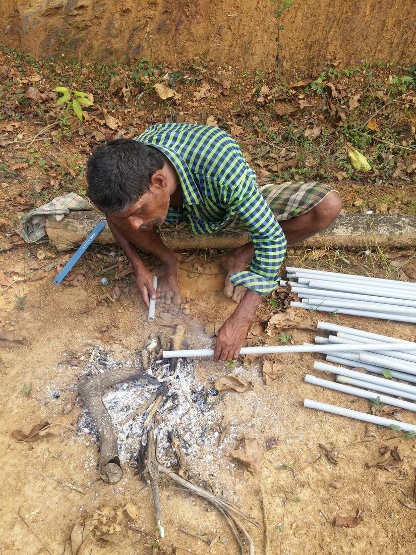 Irrigation pipes being laid across the plots, December 2018